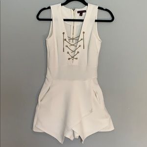 While and gold jumpsuit “skort”